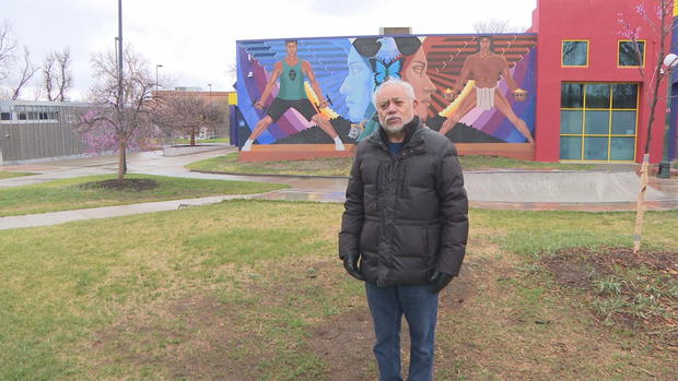 artist and mural 