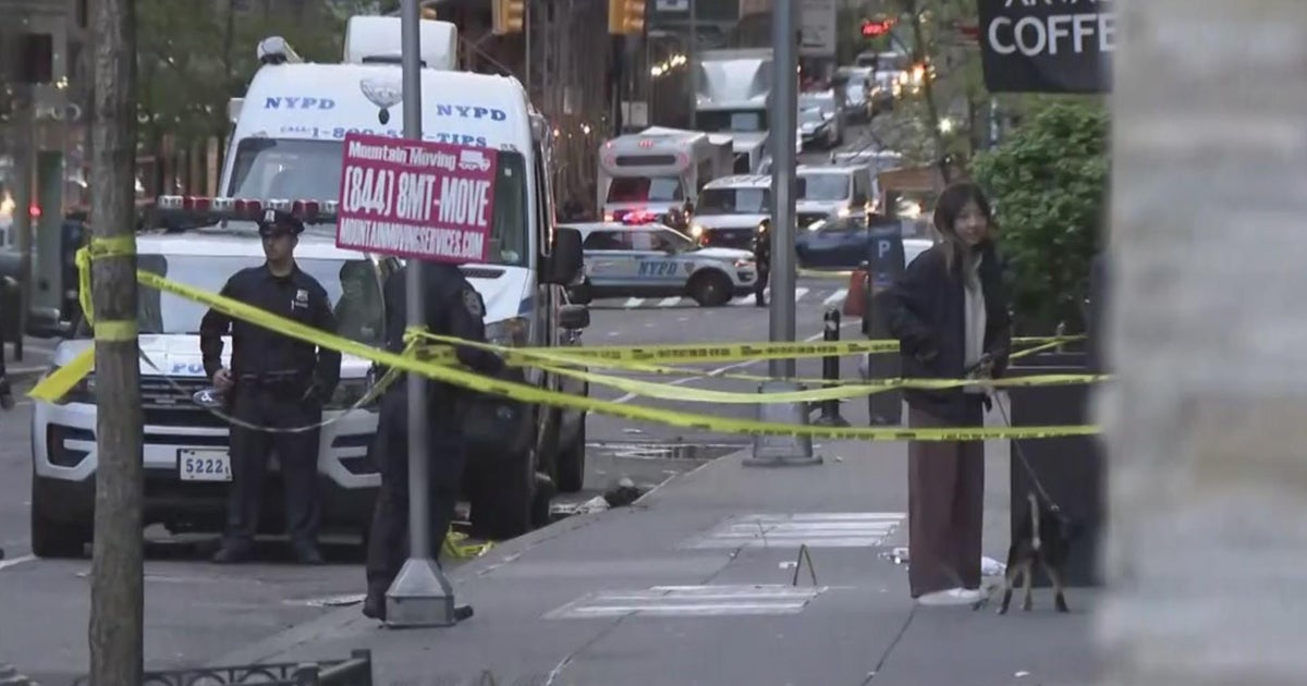 Two men shot to death inside building in Hell's Kitchen, search on for ...