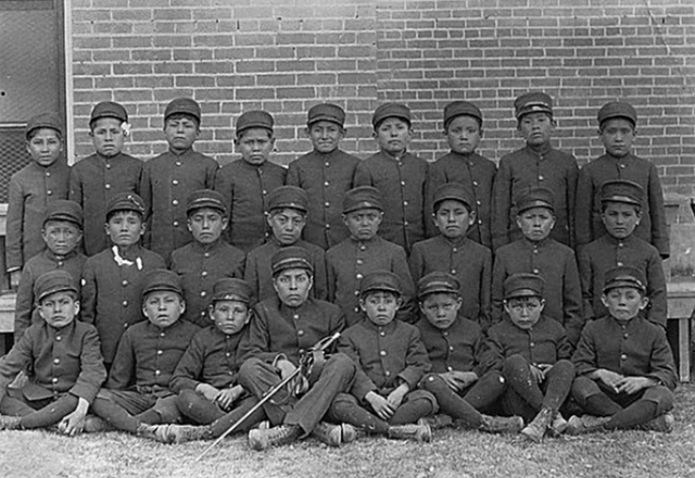 Boys in uniform at the Albuquerque Indian School, circa 1900.
