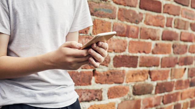 Teenager using a smartphone 