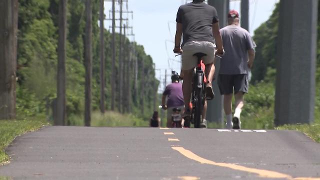 Bikers and walkers on Long Island's North Shore Rail Trail 