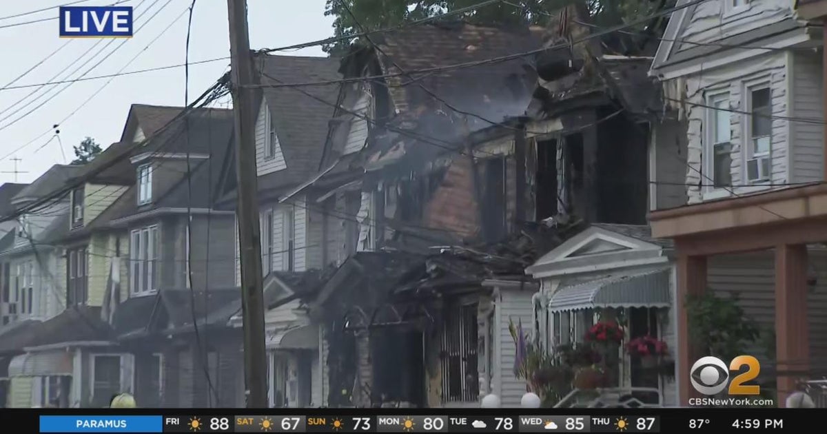 Multiple homes damaged in five-alarm fire in Queens - CBS New York