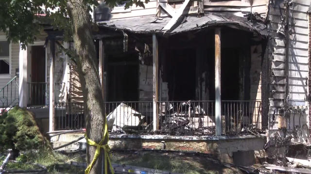 The front of a fire-damaged home in Mount Vernon 