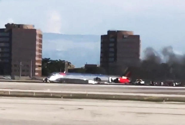 Plane catches fire at Miami airport 