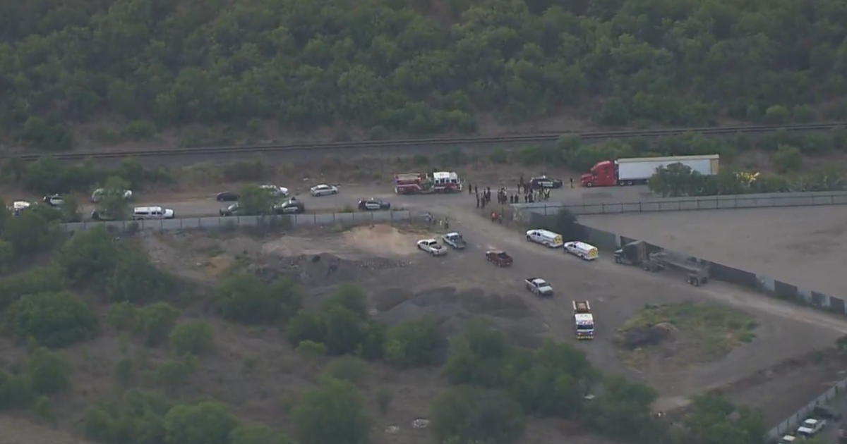 46 migrants found dead in back of tractor trailer in San Antonio – CBS News