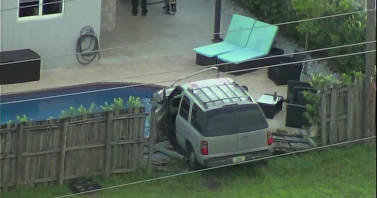 SUV smashes through Dania home’s fence, nearly ends up in pool