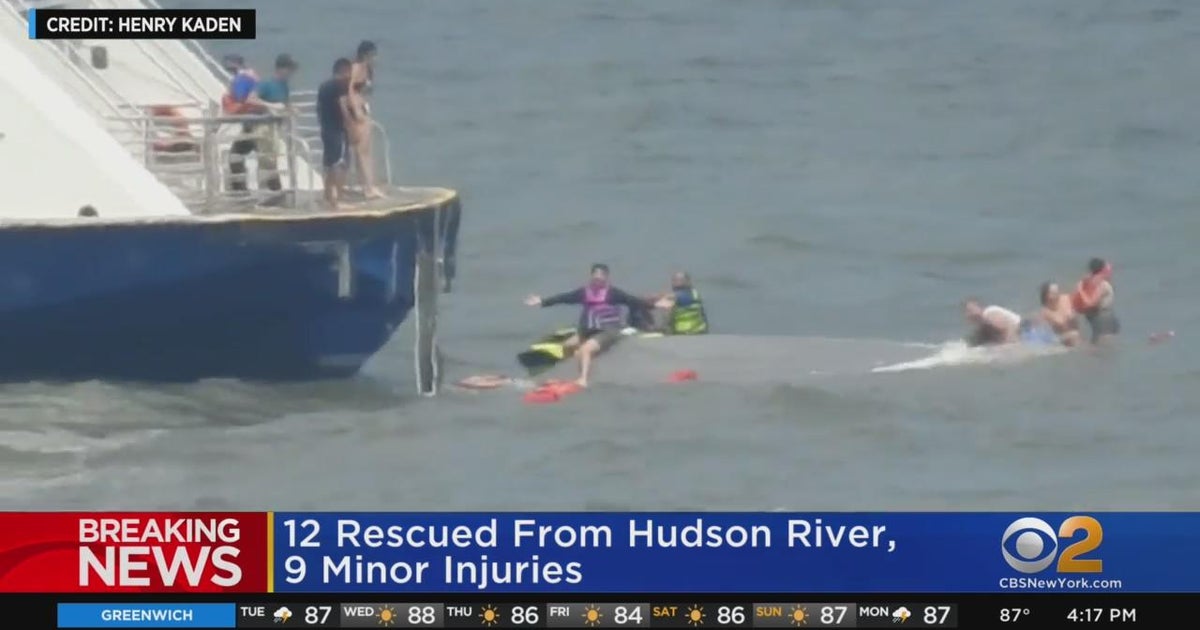 A dozen rescued after boat capsizes in Hudson River - CBS New York