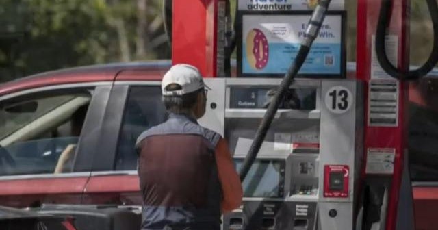 Gasoline prices continue to drop across the U.S. CBS News