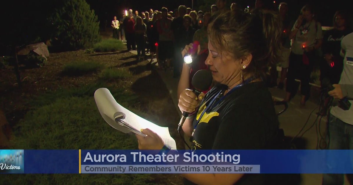 Midnight vigil remembers the lives lost during the Aurora movie theater