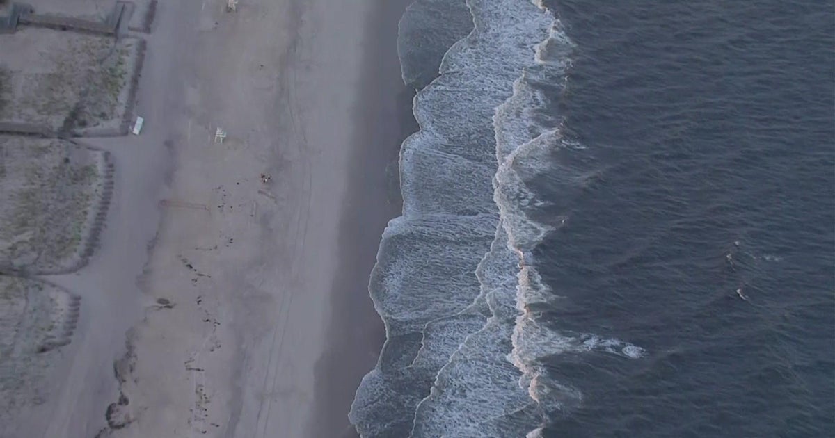 Teenage surfer bitten by shark off Fire Island, Suffolk County officials say CBS New York