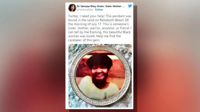 A screenshot of a tweet reading, "Twitter, I need your help! This pendant was found in the sand on Rehoboth Beach DE this morning of July 17. This is someone's sister, mother, warrior, ancestor, or friend. I can tell by the framing this beautiful Black wo 