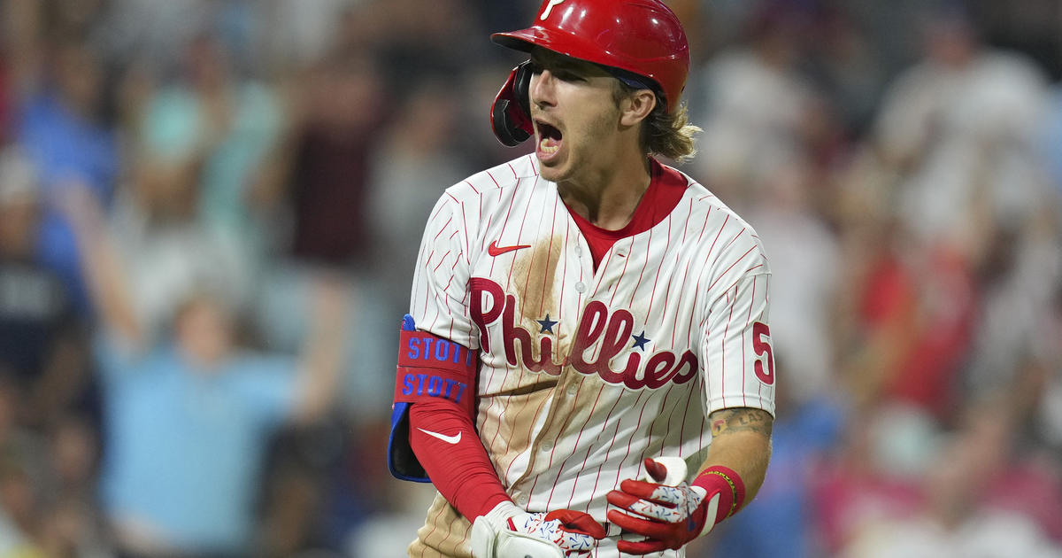 Bryson Stott of the Philadelphia Phillies throws to first base News  Photo - Getty Images