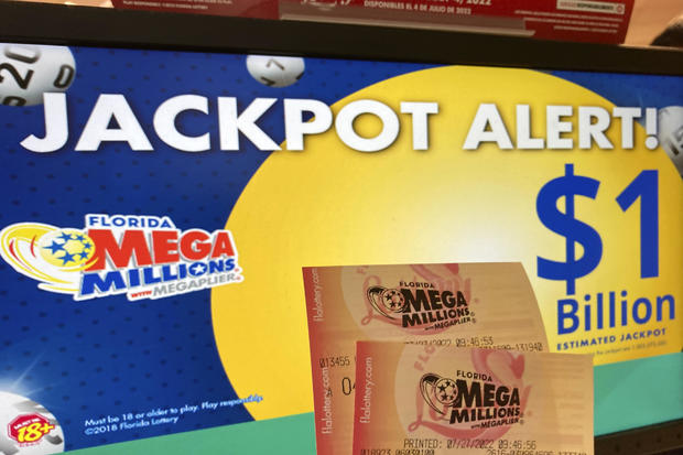 Mega Millions lottery tickets are seen at a lottery retailer in Surfside, Fla., July 27, 2022. 