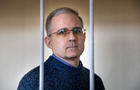 In this Aug. 23, 2019, file photo, Paul Whelan, a retired U.S. marine who was arrested for alleged spying in Moscow on Dec. 28, 2018, speaks while standing in a cage as he waits for a hearing in a courtroom in Moscow, Russia. 