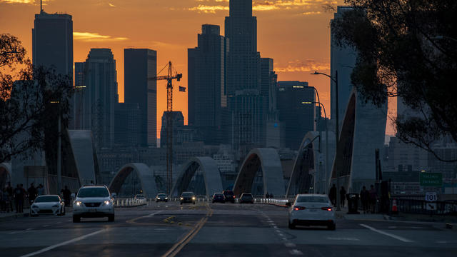 Clouds float over downtown Los Angeles and the new 6th Street Bridge 