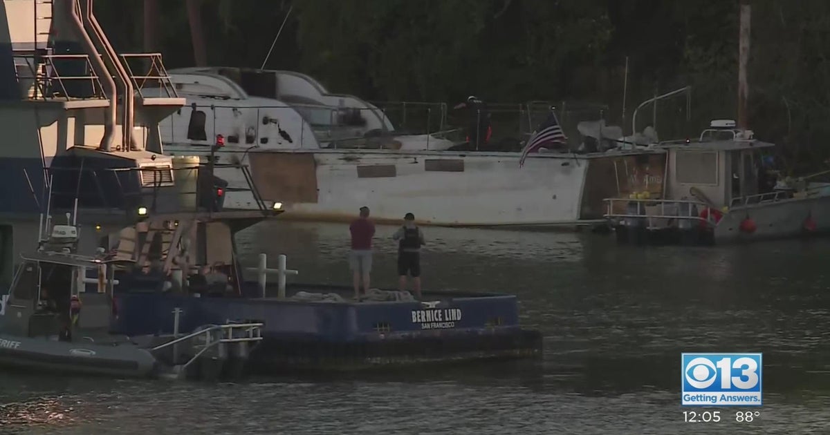 Crews demolish and dispose of burned boat on Sacramento River