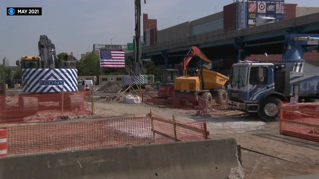 A construction site with multiple construction vehicles. 