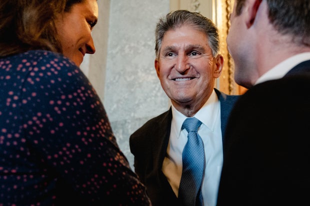 WASHINGTON, DC - AUGUST 6: Senator Joe Manchin (D-WV) chats wit