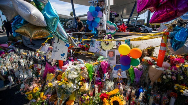 family members of the victims of Thursday's deadly crash on Slauson and La Brea avenues and community members  hold aprayer vigil at the intersection in their memory. 