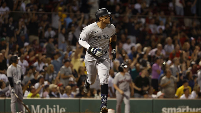Aaron Judge #99 of the New York Yankees watches his solo home run against the Boston Red Sox during the third inning at Fenway Park on August 12, 2022 in Boston, Massachusetts. 