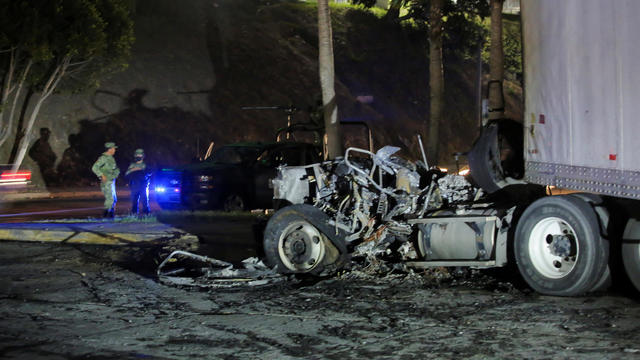 A view shows burnt vehicles after they were set on fire by unidentified individuals in Tijuana 