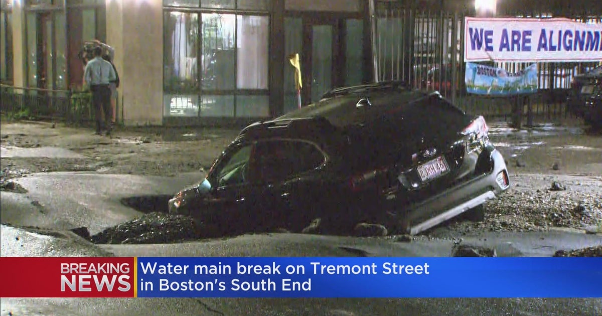 Water main break floods part of South End, leaves car stuck in sinkhole ...