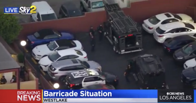 Robbery suspect barricaded inside motel in Westlake