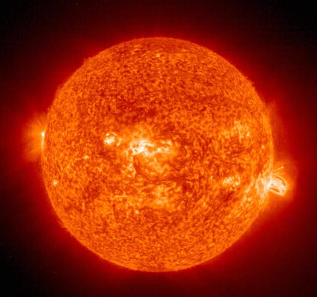 NASA image of the sun, showing a solar flare and coronal mass ejection 