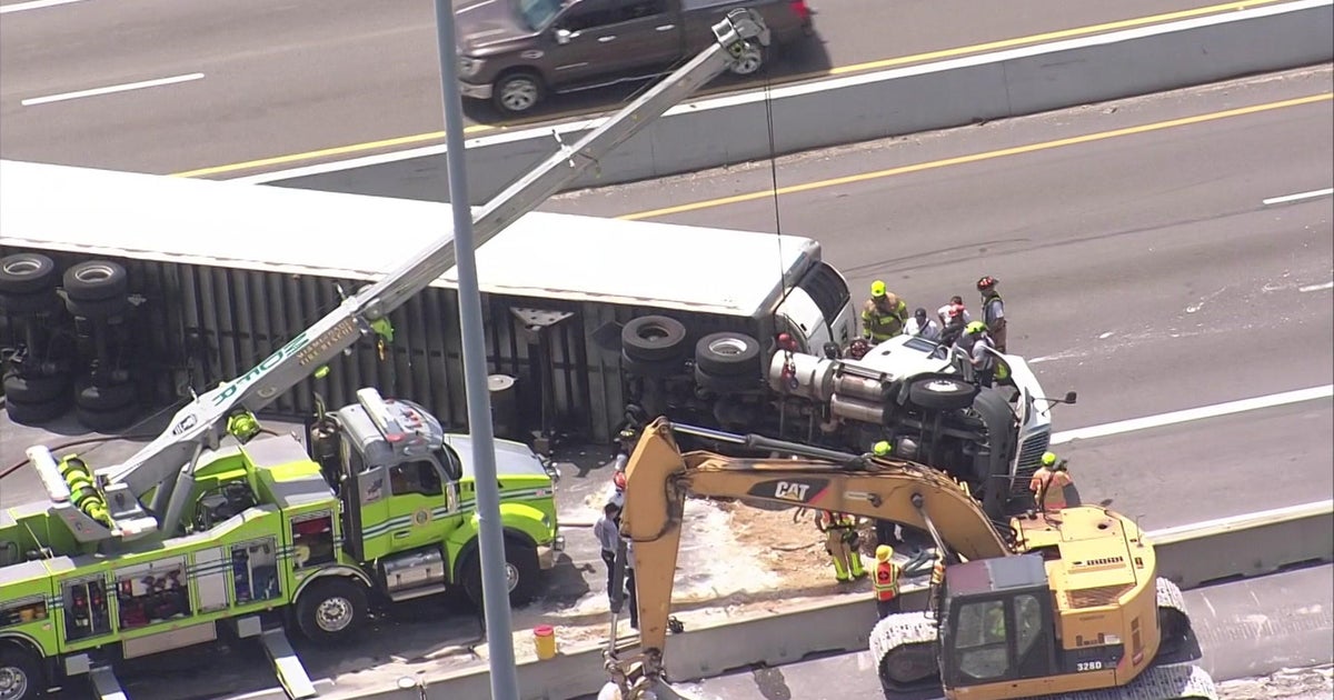 Overturned tractor-trailer affecting traffic in NW Miami-Dade