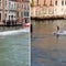 Two tourists surf in Venice canal illegally