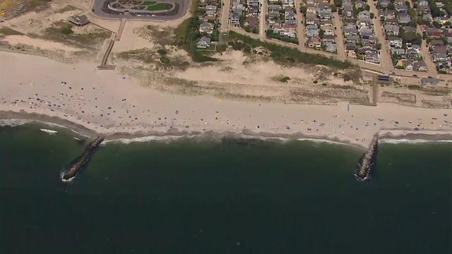 An aerial shot of the shore at a Long Island beach. 