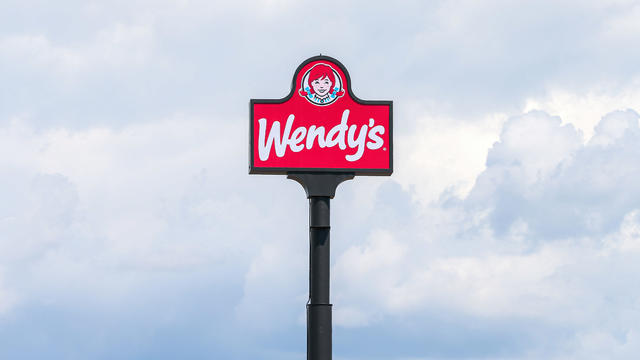 The Wendy's logo is seen above the restaurant near 