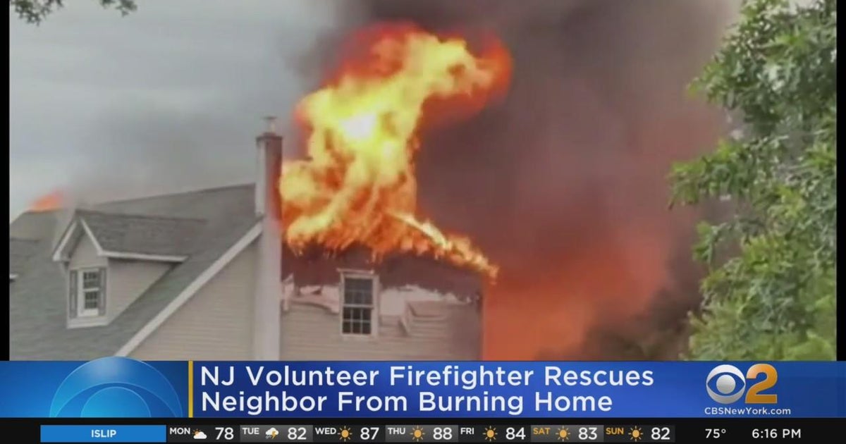 Volunteer firefighter rescues neighbor from burning home - CBS New York