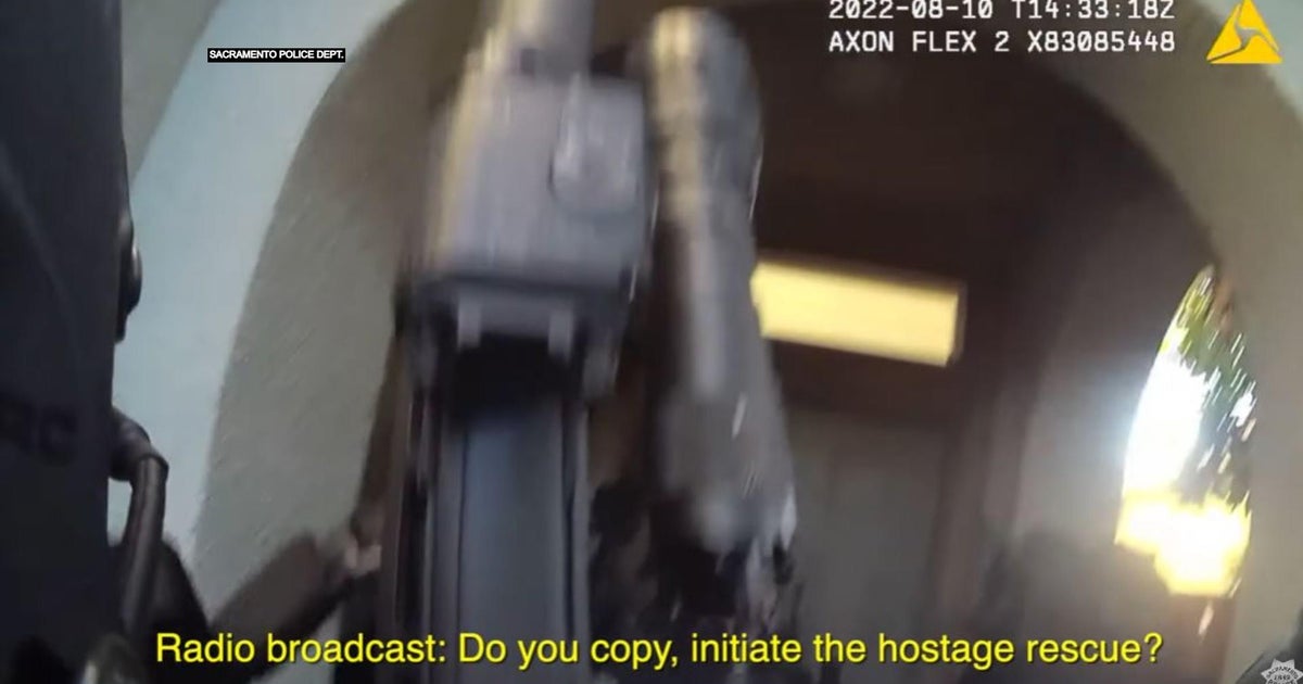 Body cam video released of officer shooting man armed with sword who was allegedly holding his family hostage in Sacramento home