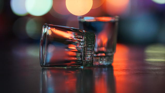 Shot Glasses On Table In Bar 