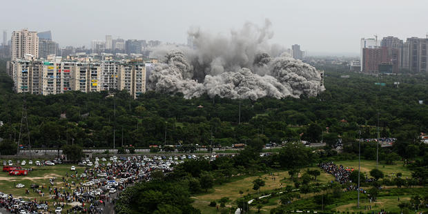 Implosion demolishes twin high-rise buildings on the outskirts of New Delhi, India 