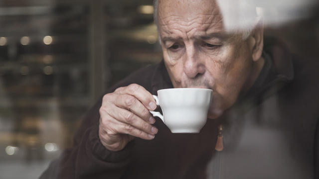 Senior man drinking tea 