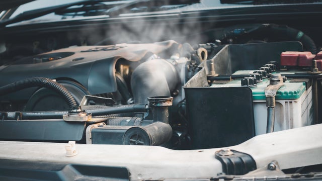 Automotive engine overheating on the road 