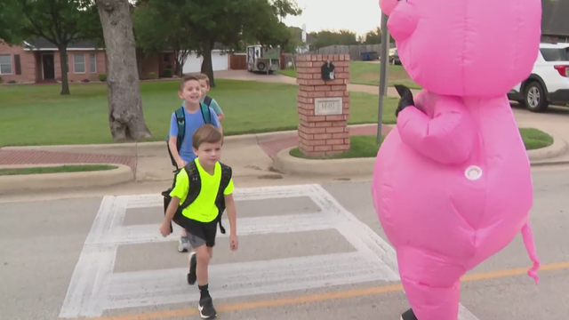 Keller ISD crossing guard aims to bring out smiles with fun costumes 
