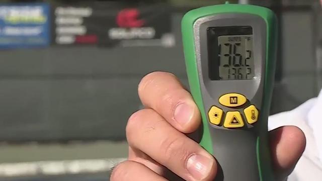 This is a photo of a thermometer used to check the surface temperature of a tennis court at McKinley Park. 