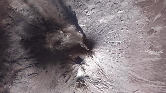 Satellite image of eruption of Kliuchevskoi or Klyuchevskaya Sopka volcano, Kamchatka Peninsula, Russia, 2010. Has been active almost continuously since its first recorded eruption in 1697. Credit NASA. Science Geology Vulcanology 