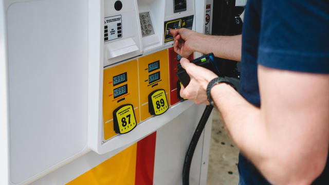 Man Uses Credit Card to Purchase Gas at Pump 