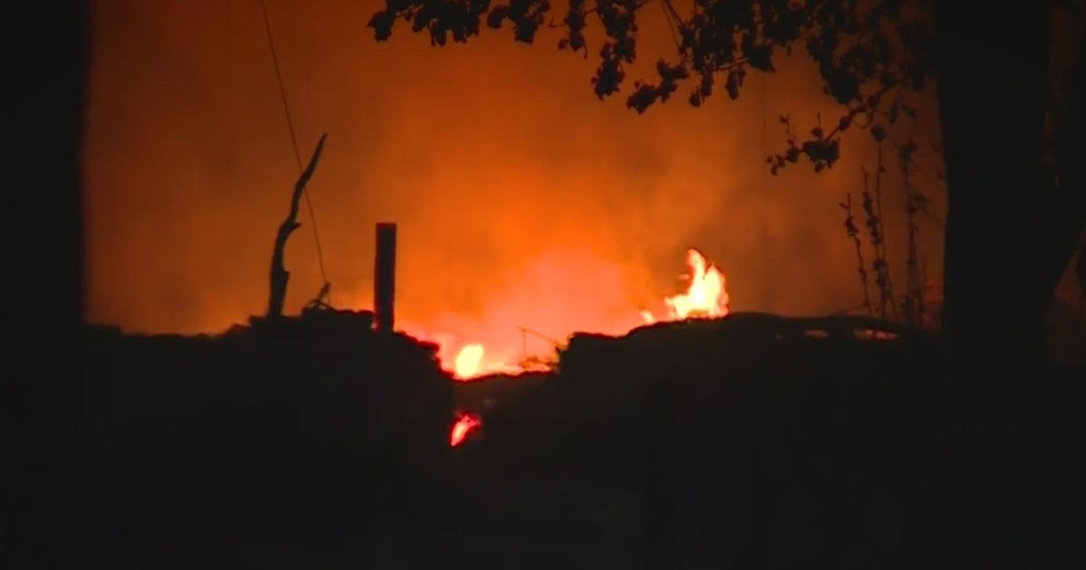 Residents rush to escape a massive the Mill Fire