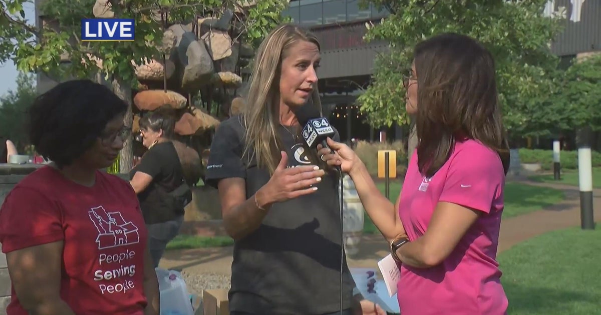 Surly Brewing volunteers help pack dental hygiene kits for people