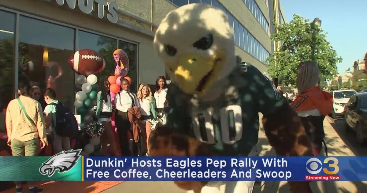 Dunkin #39 hosts Eagles pep rally with free coffee cheerleaders and swoop