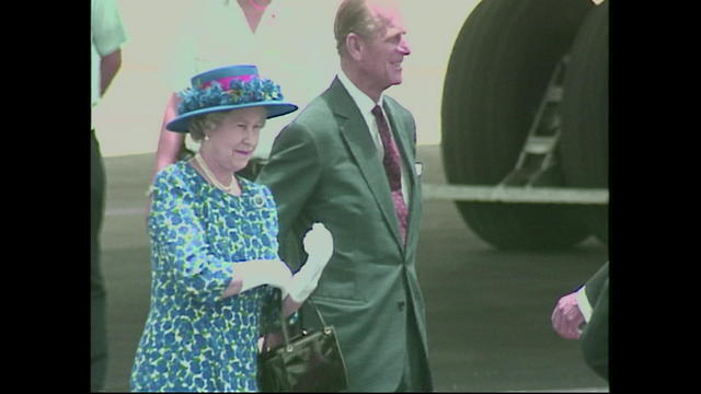 Queen Elizabeth II walking her dogs at Windsor Castle 