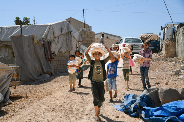 Bread Distribution In The Camps In Syria 