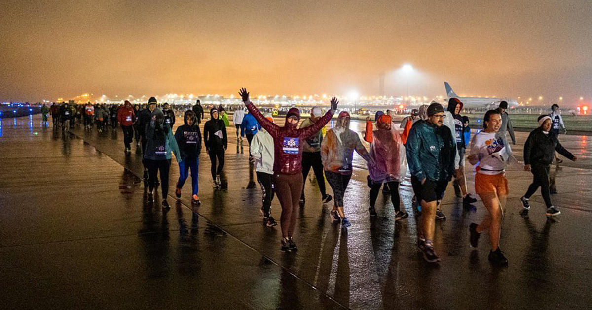 Runners brave cold, soggy weather for firstever 5K on a Denver