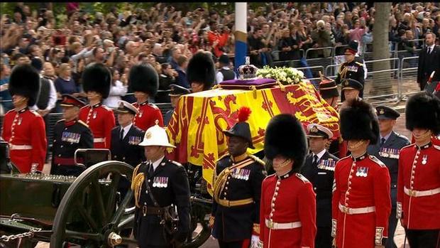 Crowds gathered to watch the procession from Buckingham Palace to the Palace of Westminster, where Queen Elizabeth II will lie in state in Westminster Hall. 