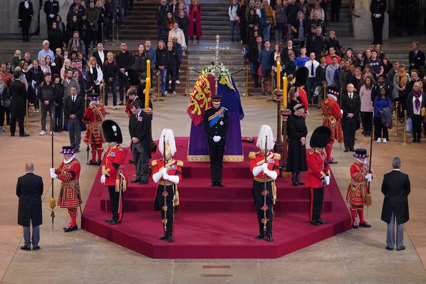 Queen Elizabeth II's 8 grandchildren, including Princes William and Harry, held silent vigil beside her coffin